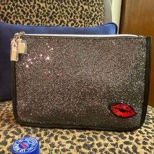 Glittery Black Clutch with Red Lip Detail pin and lipstick zipper pull charm